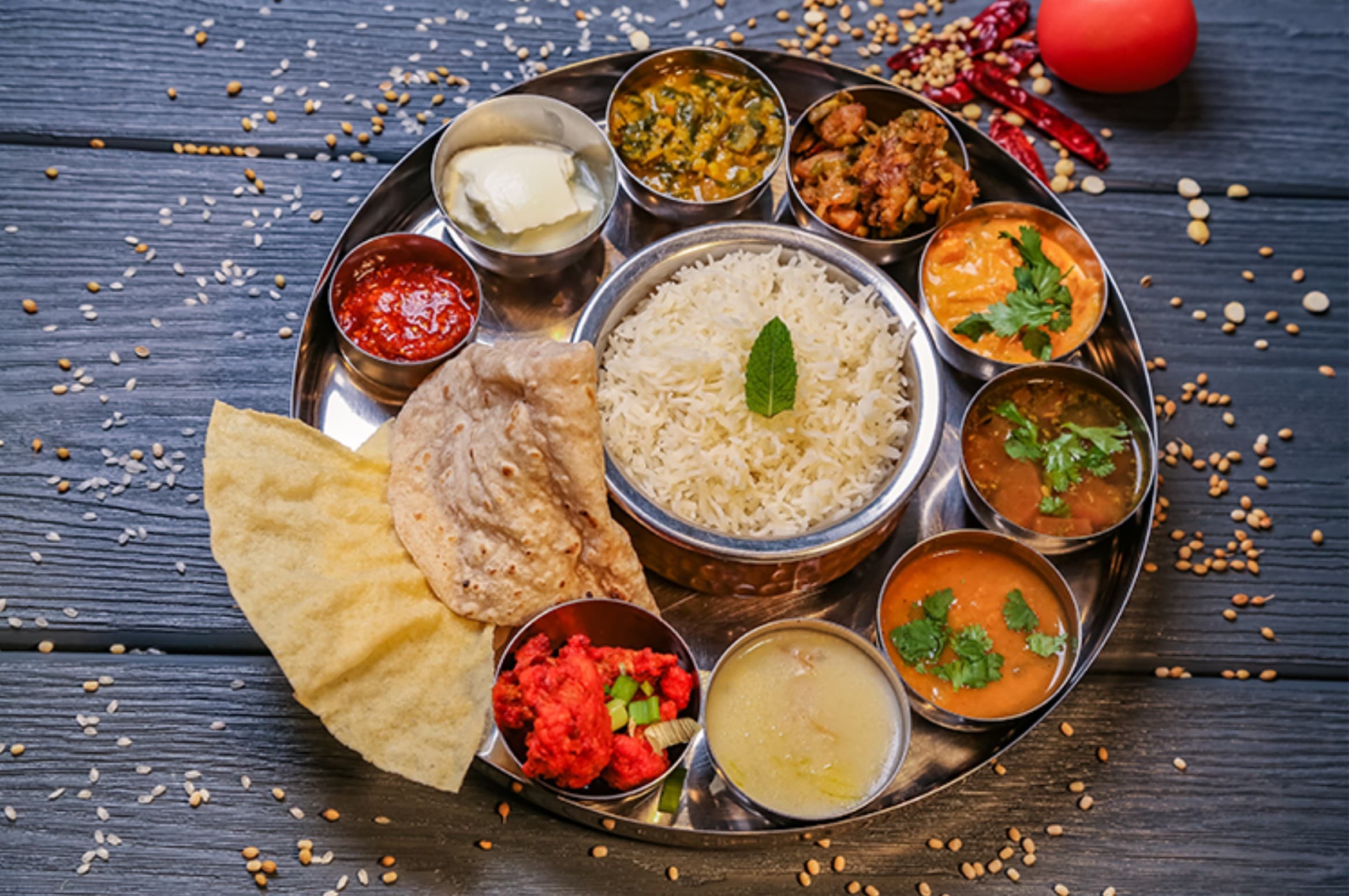 Veg thali with rotis, rice and assorted curries
